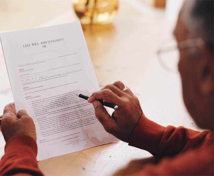 Positive aged couple consulting with insurance agent